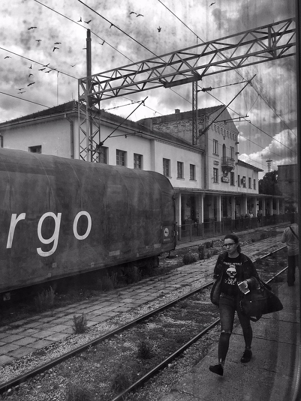 Gritty train station under clouds